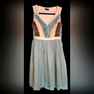 Small sleveless mini dress with sheer lace